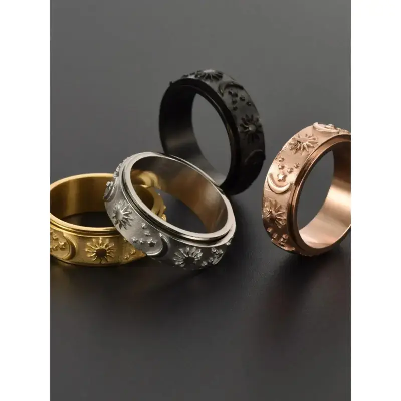 Sun and moon spinner rings in gold, silver, black and rose gold colorways