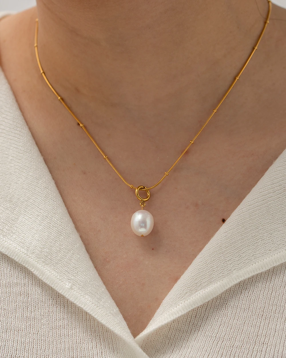 Genuine freshwater baroque pearl pendant necklace worn on model
