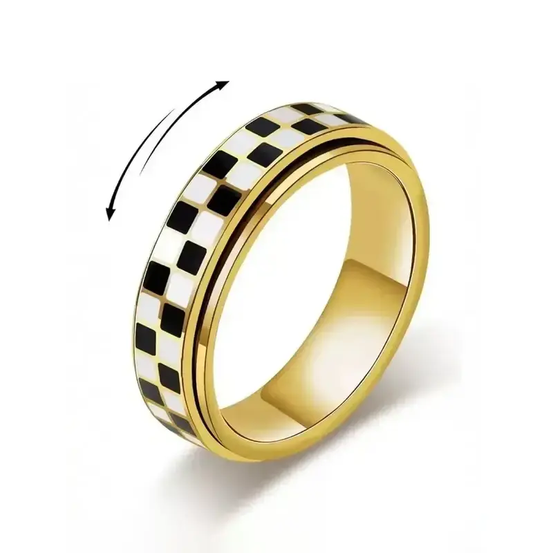 Gold checkerboard spinner ring with rotating black and white checkered band